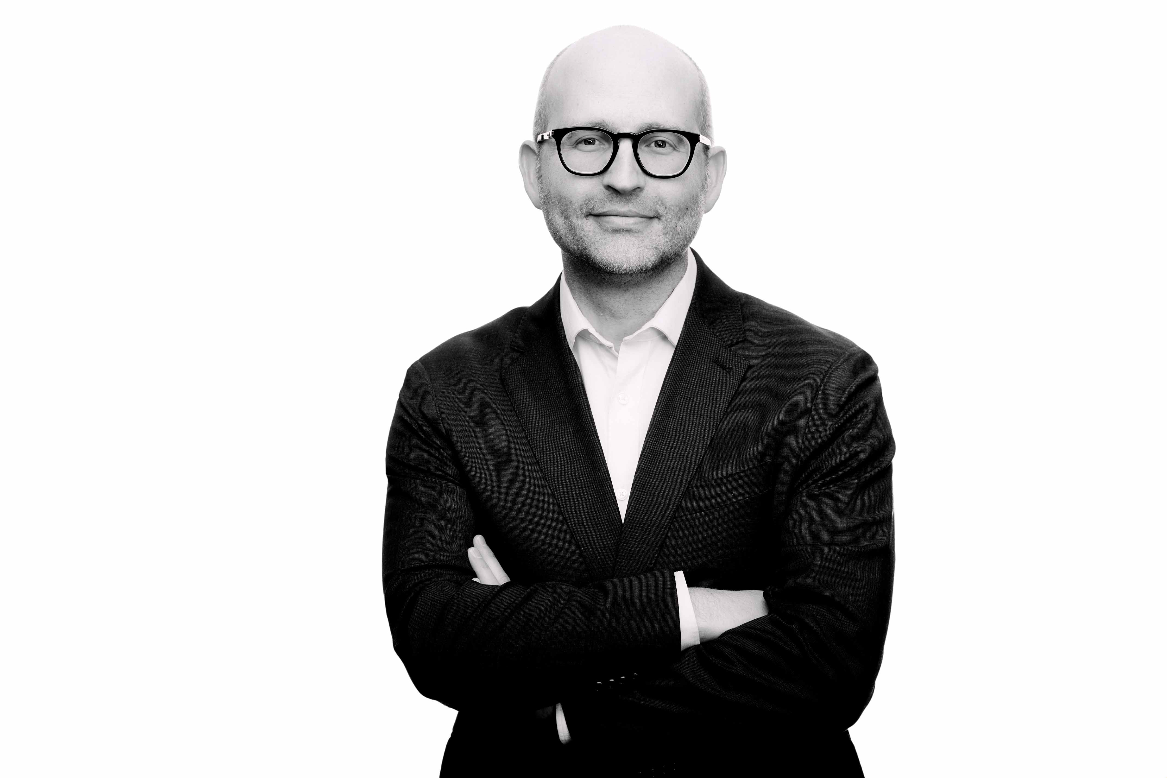 Headshot of Carl Hoiland, Zanskar cofounder and CEO.